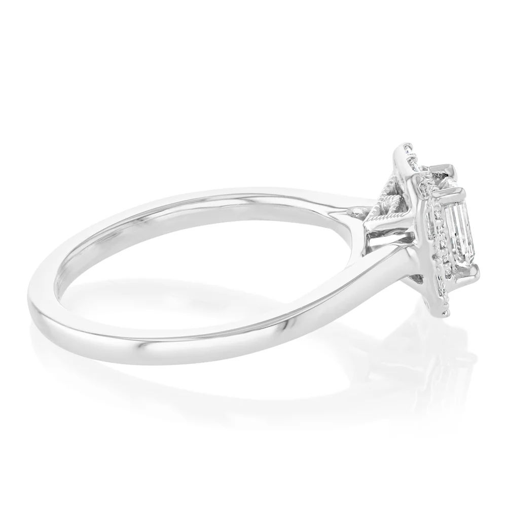 1/2 Carat Diamond Ring With Emerald Cut Centre Diamond Surrounded by Brilliant and Baguette Diamond Halo in Platinum - Image 2