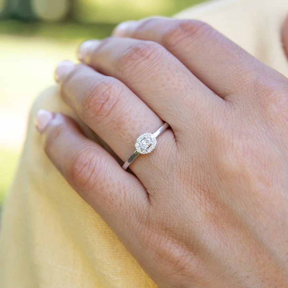 10ct White Gold 1/6 Carat Diamond Ring with Oval Centre and Halo - Image 3