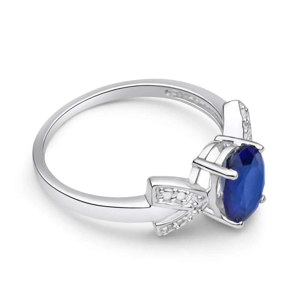 9ct White Gold Oval Created Sapphire + Diamond Ring - Image 2