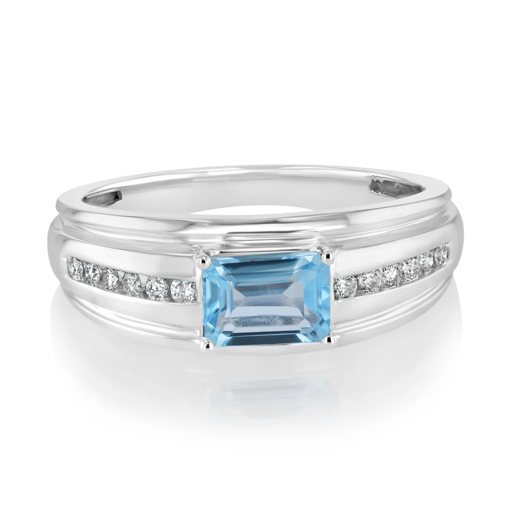 Natural Blue Topaz and 1/6 Carat Diamond Ring in 9ct White Gold