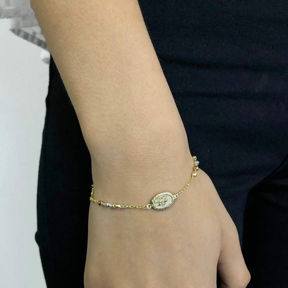 Sterling Silver and Gold Plated Oval Medallion and Cross Bracelet - Image 3
