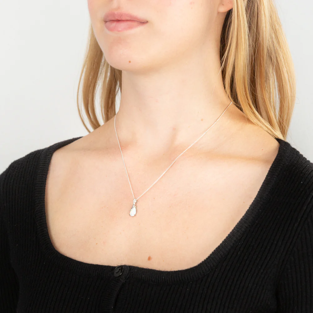 Sterling Silver Rhodium Plated Cubic Zirconia Synthetic Opal Crossover Pendant - Image 2