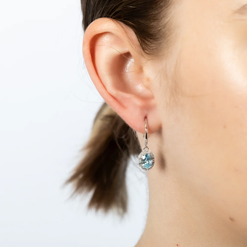 Sterling Silver Rhodium Plated White And Aquamarine Cubic Zirconia Oval Drop Earrings - Image 2