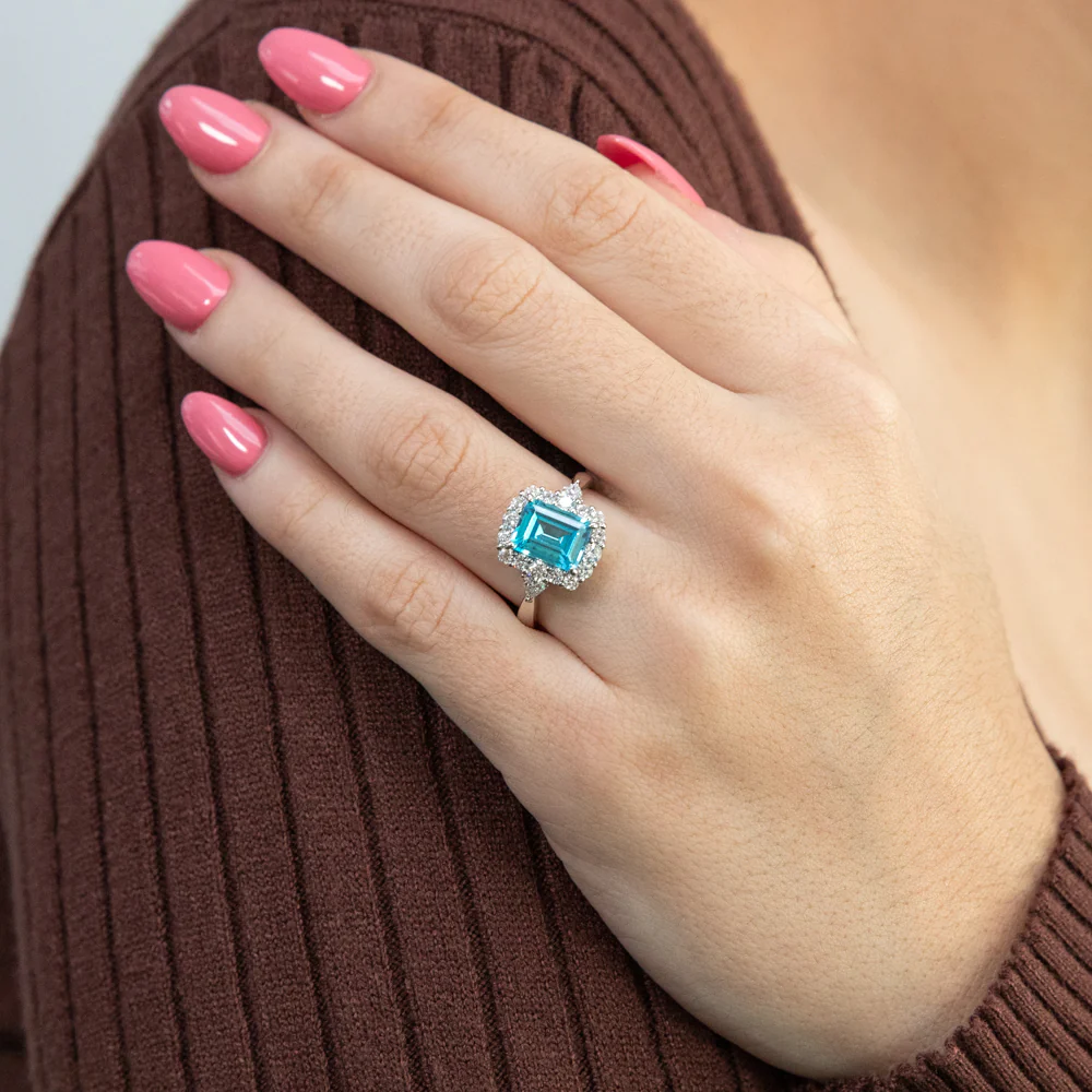 Sterling Silver Rhodium Plated White & Aquamarine Cubic Zirconia Emerald Cut Ring - Image 3